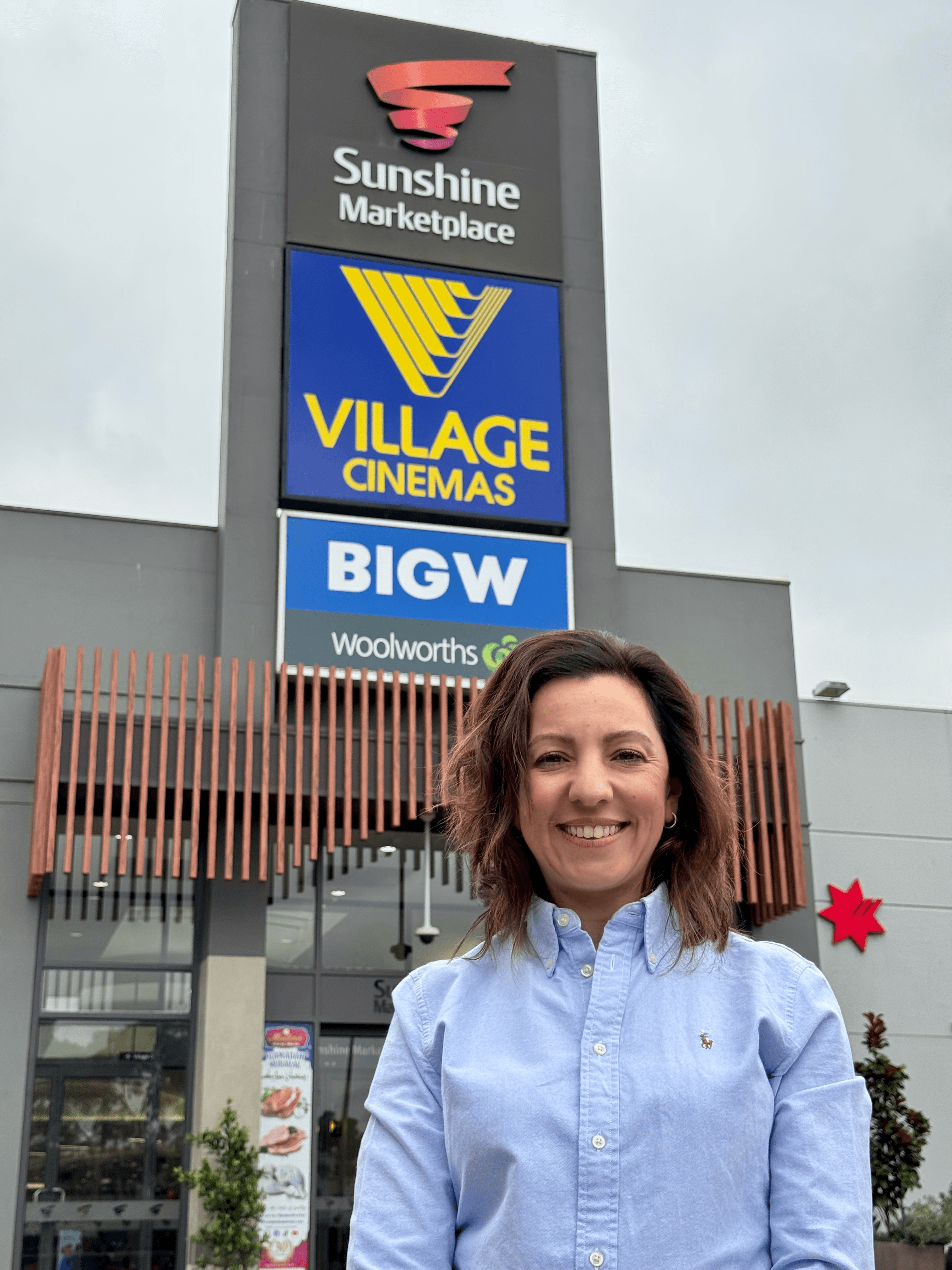 Operations Manager ChristieLee Tsacos in front of Sunshine Marketplace shopping centre