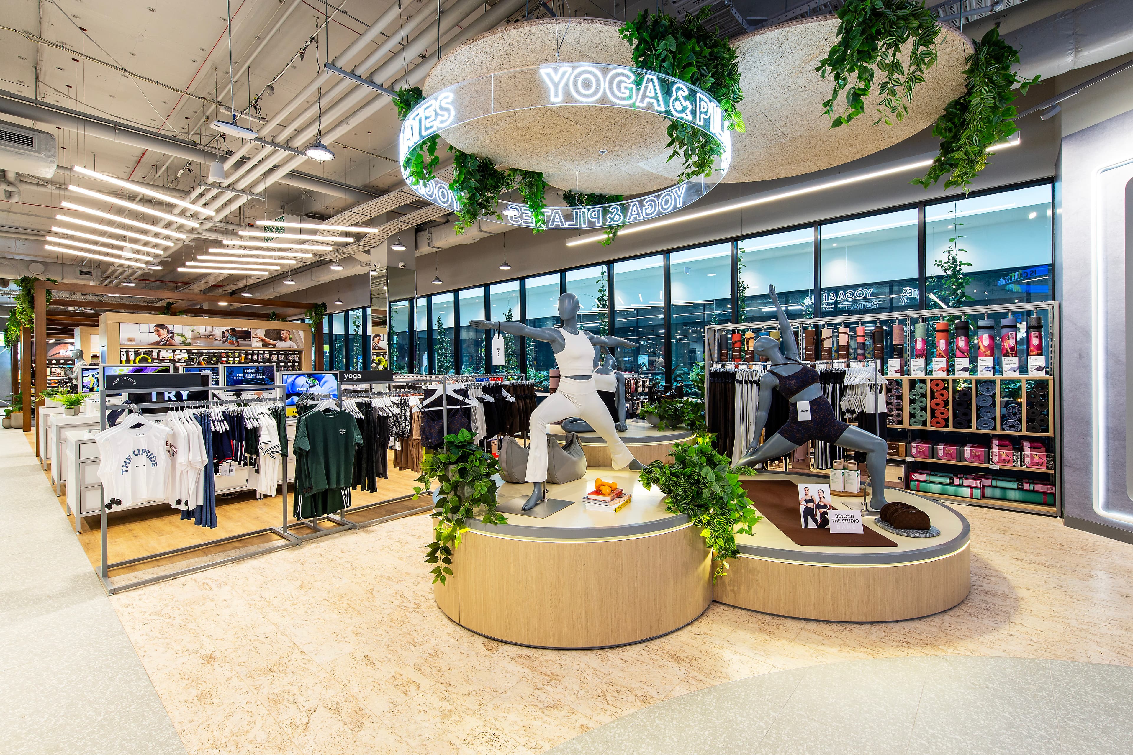 Sports store yoga department with mannekins
