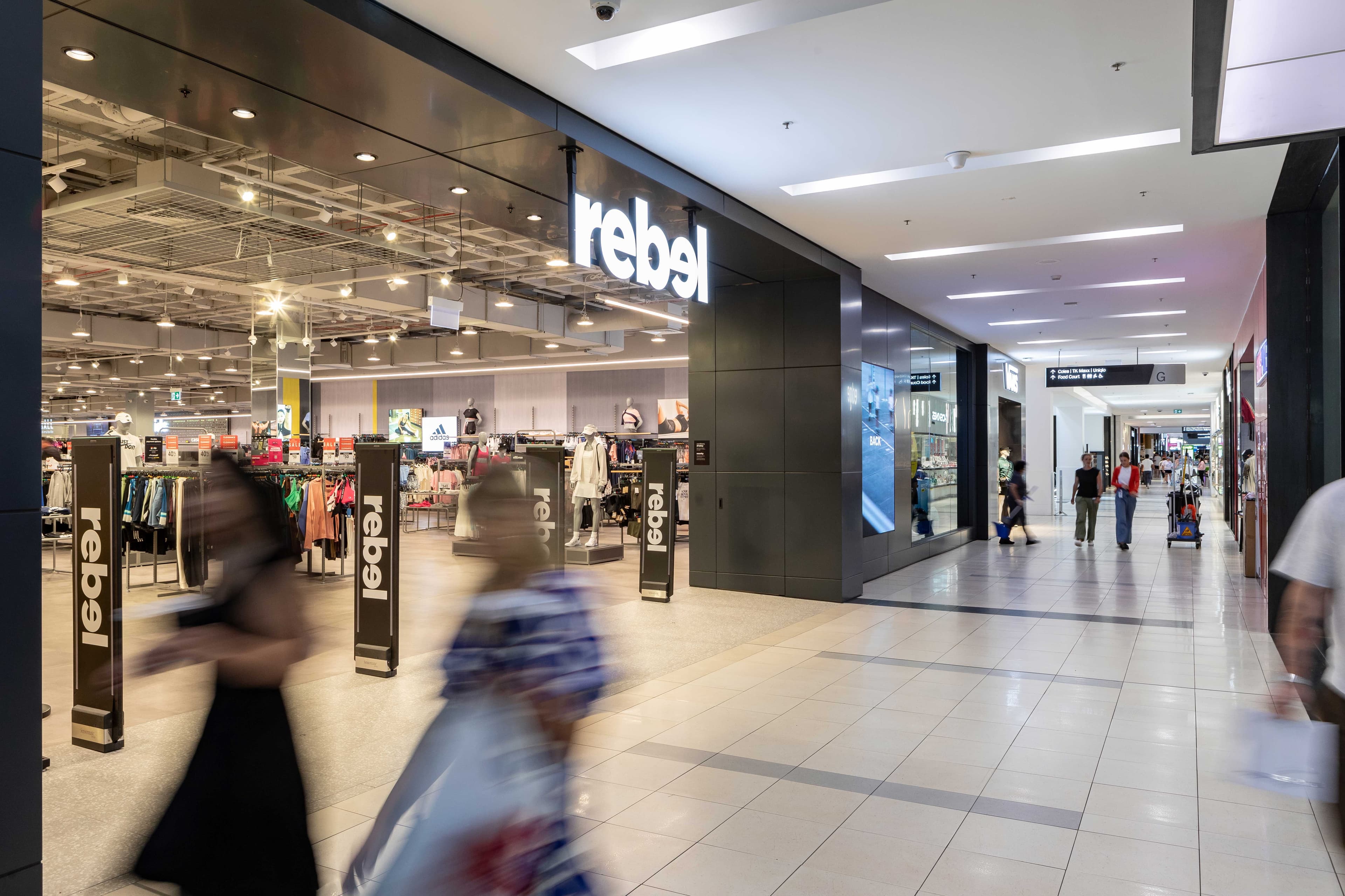 People walking past Rebel